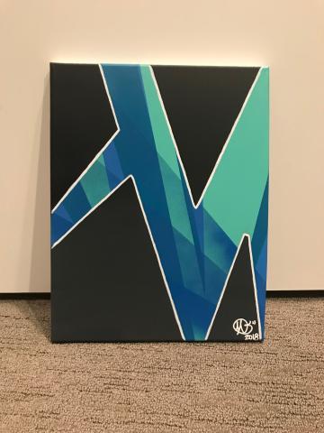 M painting in blue
